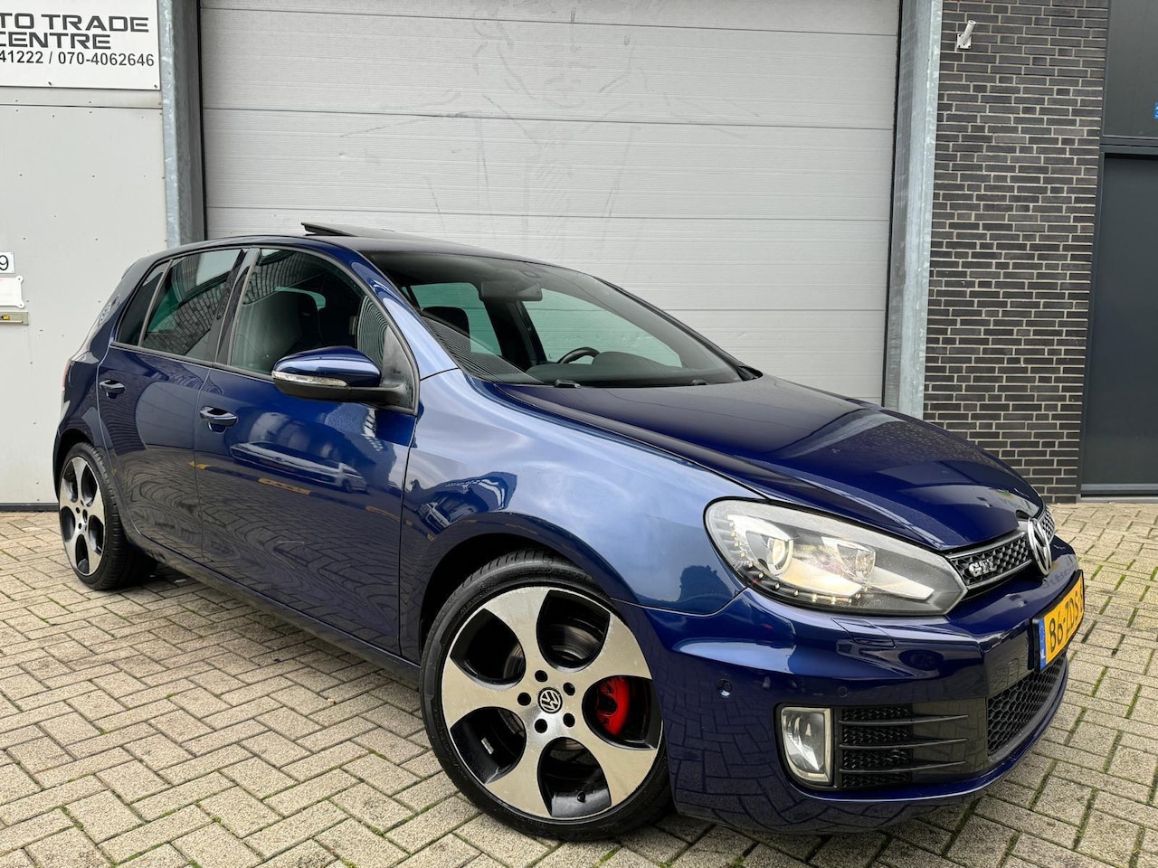 Volkswagen Golf - 1.4 TSI Highline [Open dak|StoelVW|Xenon|Cruise|Navi|PDC] - AutoWereld.nl