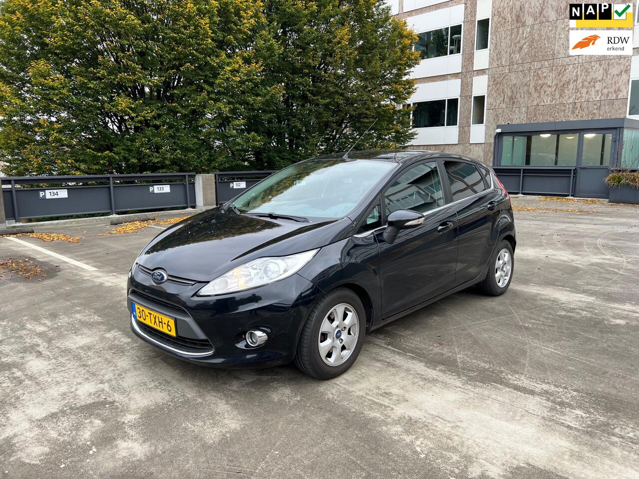 Ford Fiesta - 1.6 TDCi ECOnetic Titanium 5drs Clima Cruise 1e - AutoWereld.nl