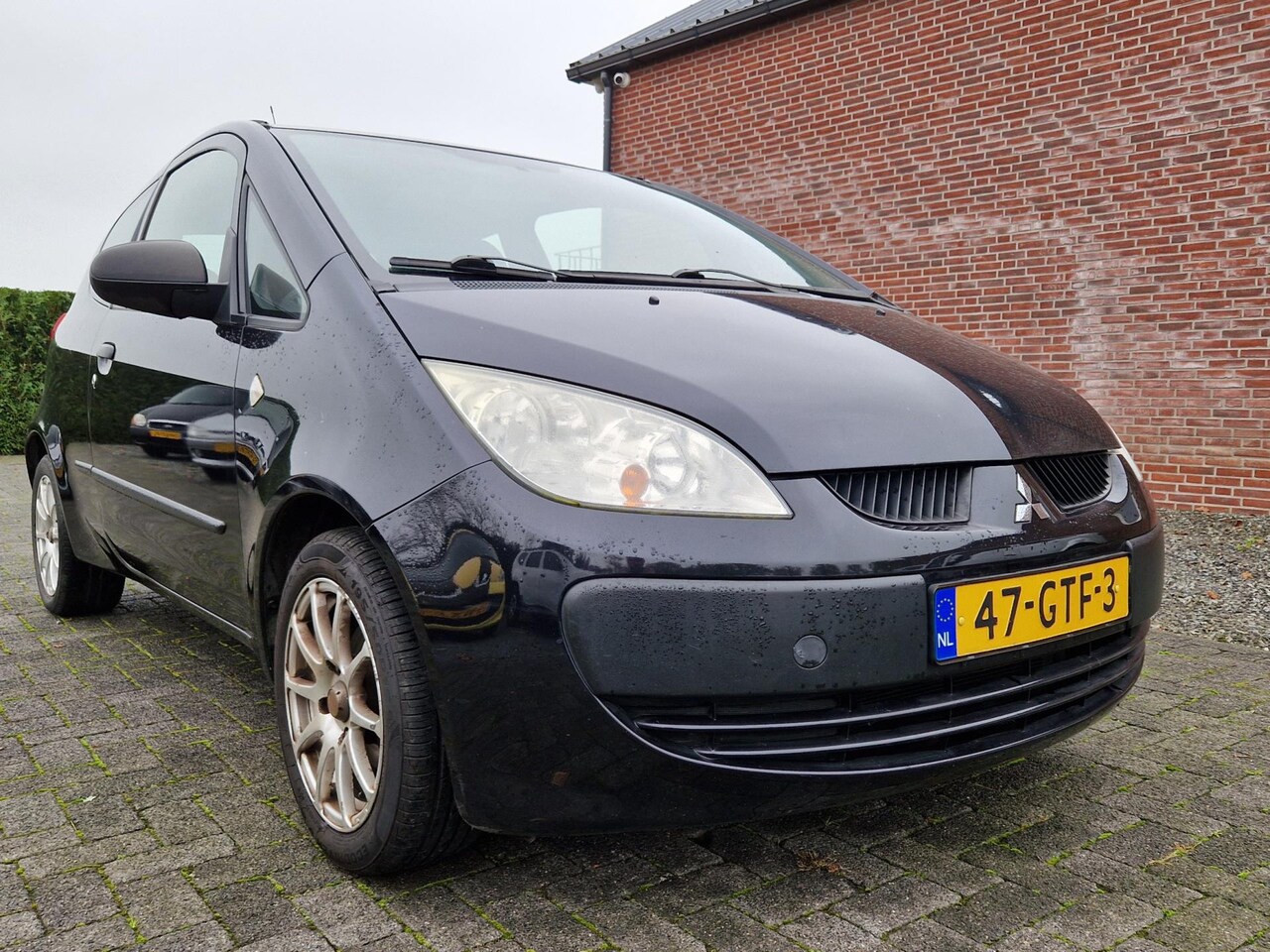 Mitsubishi Colt - 1.1 Incharge - AutoWereld.nl