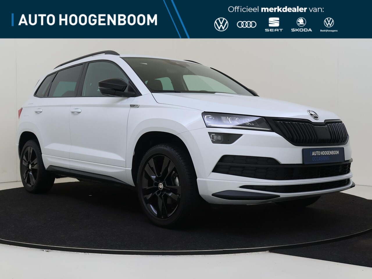 Skoda Karoq - 1.5 TSI ACT Sportline Business | Panoramadak | Trekhaak | Keyless | Navigatie | Achteruitr - AutoWereld.nl