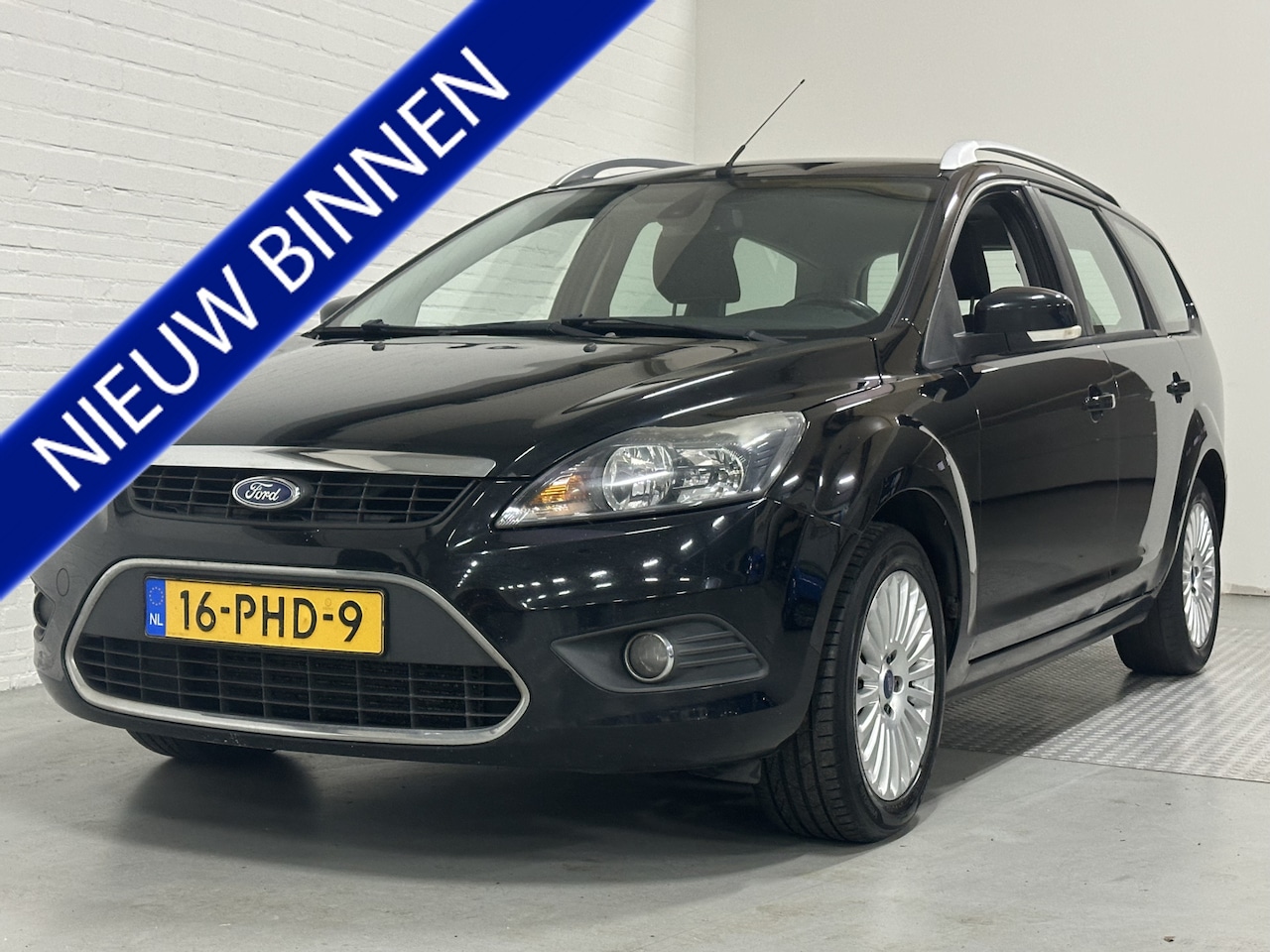 Ford Focus Wagon - 1.6 TDCi Limited CLIMA / CRUISE / NAVI  / TREKHAAK - AutoWereld.nl