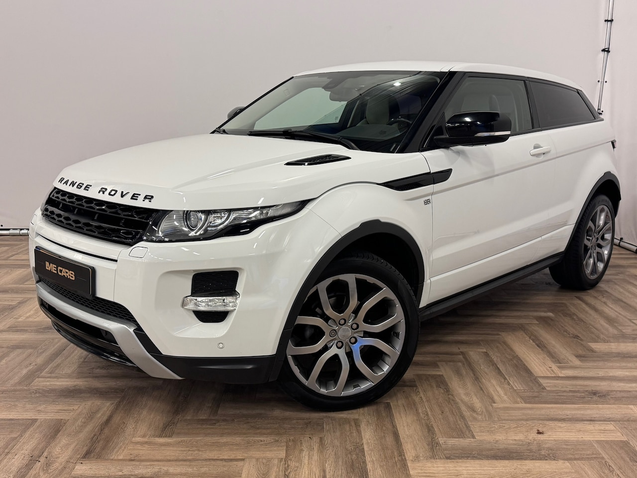 Land Rover Range Rover Evoque Coupé - 2.0 Si 4WD Prestige 2.0 Si 4WD Prestige, AUTOMAAT, STUURVERWARMING! - AutoWereld.nl