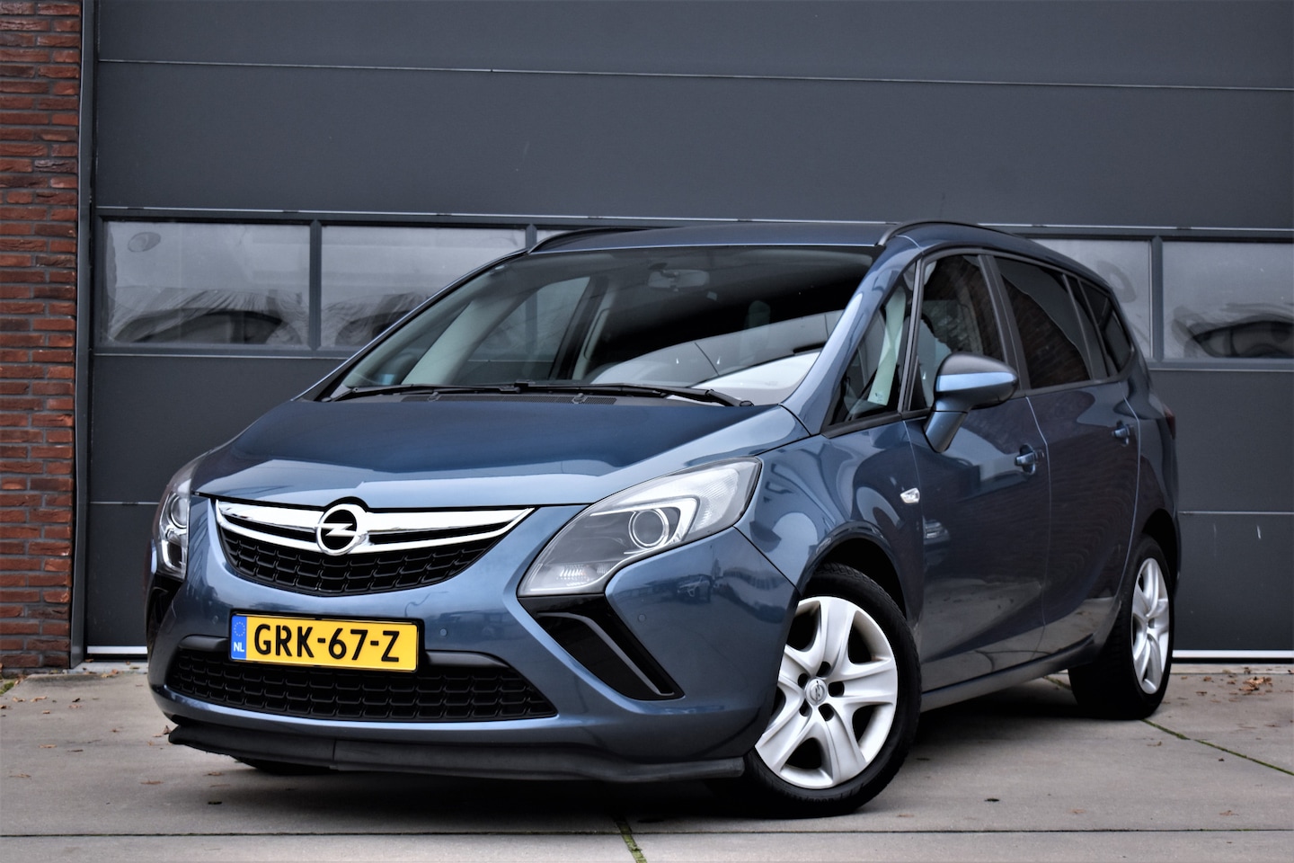 Opel Zafira Tourer - 1.4 Design Edition 7p. Navi - Cruise - Pdc - Stoelverw. - AutoWereld.nl