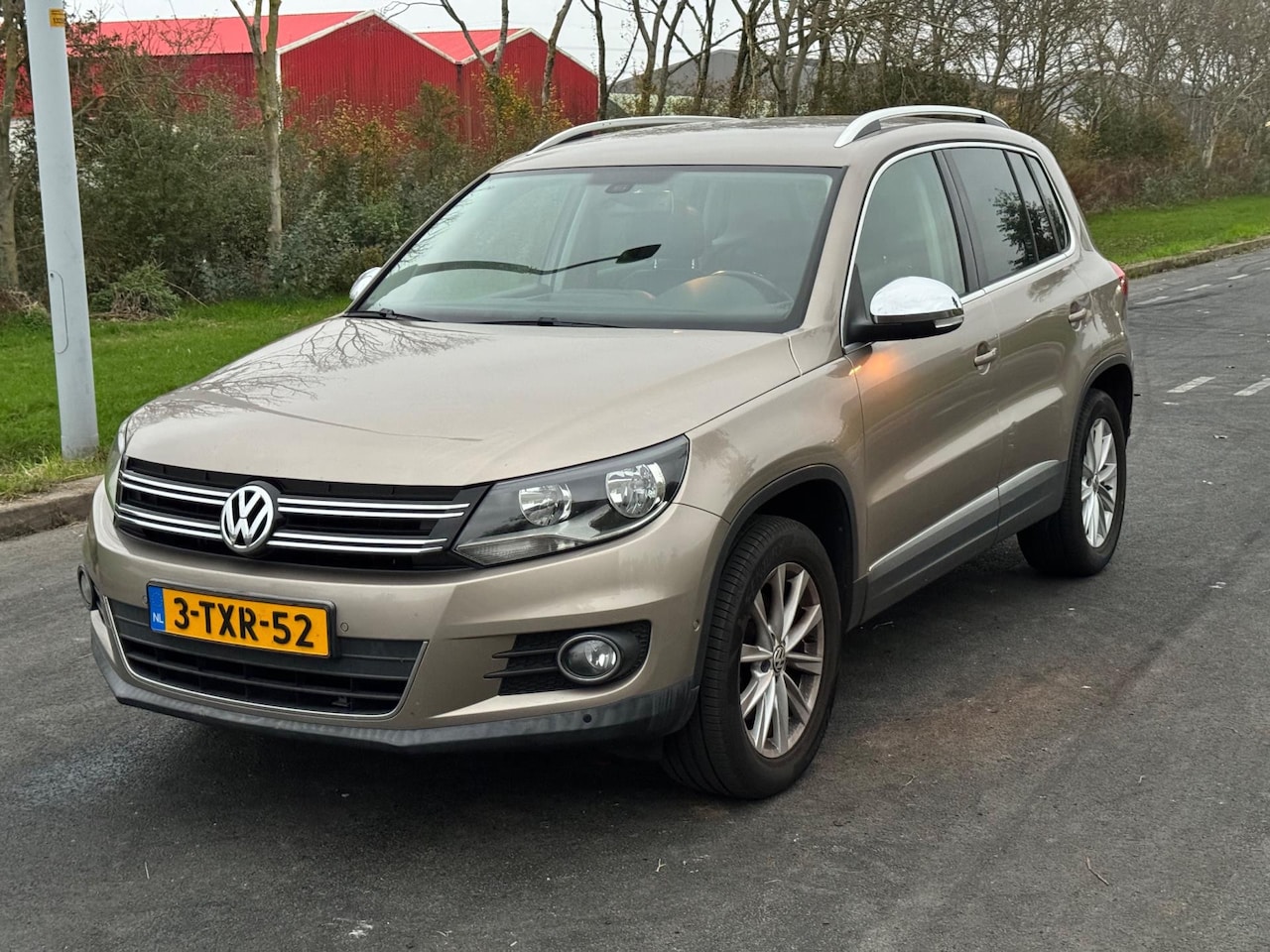 Volkswagen Tiguan - 1.4 TSI Sport&Style / AIRCO / NAP - AutoWereld.nl