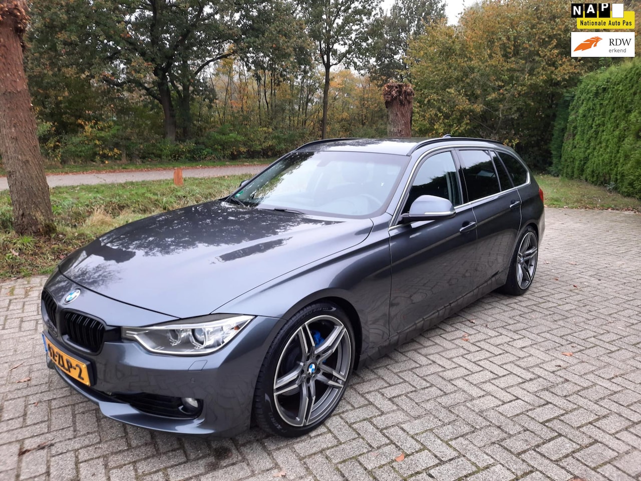 BMW 3-serie Touring - 328i High EXE NAVIGATIE ECC HARMAN CARDON - AutoWereld.nl