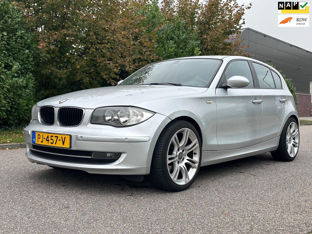 BMW 1-serie - 118i Executive 5DR*Stoelverwarming*Airco*LM velgen*Parkeersensoren*11-07-2025 APK* - AutoWereld.nl