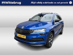 Skoda Karoq - 1.5 TSI ACT Sportline Business / AUTOMAAT/ TREKHAAK/ PANO/ DCC/ CANTON AUDIO/ CAMERA/ PARK