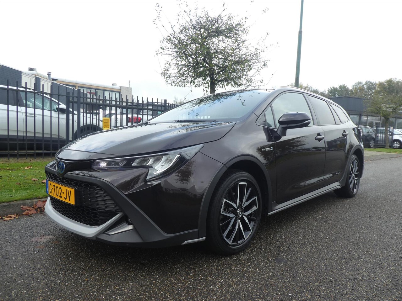 Toyota Corolla Touring Sports - 1.8 Hybrid 122pk CVT TREK Navigatie Multi Media NL-Auto - AutoWereld.nl