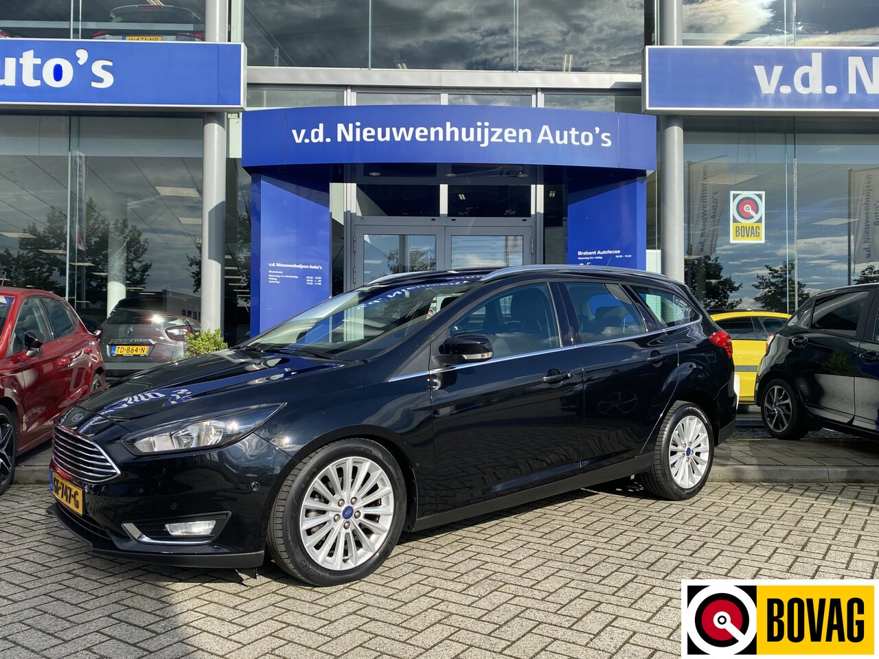 Ford Focus Wagon - 1.0 First Edition Navi | Parkeer sensoren | Cruise control | info Bas: 0492-588 982 - AutoWereld.nl