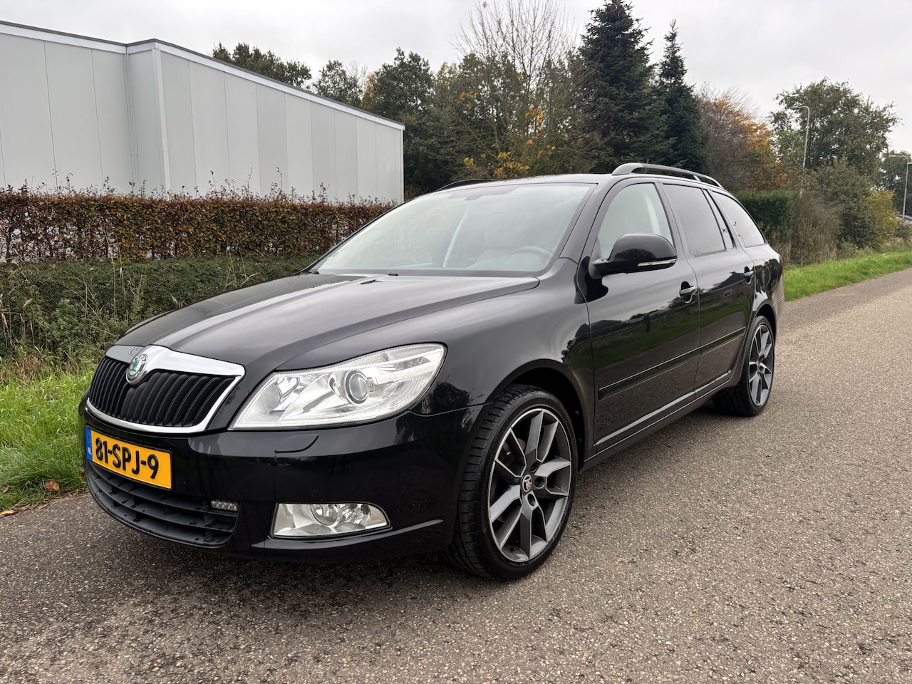 Skoda Octavia Combi - 1.2 TSI Elegance Business Line / NAVI / CRUISE / AIRCO - AutoWereld.nl