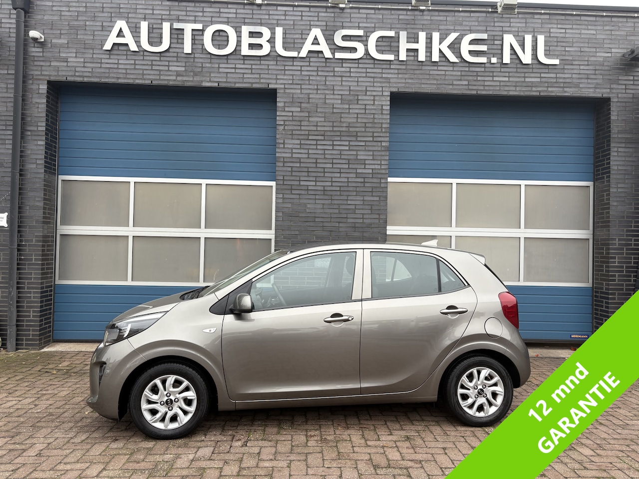 Kia Picanto - 1.0 CVVT ComfortPlusLine Navigator 1.0 CVVT ComfortPlusLine Navigator, airco, lichtmetaal - AutoWereld.nl