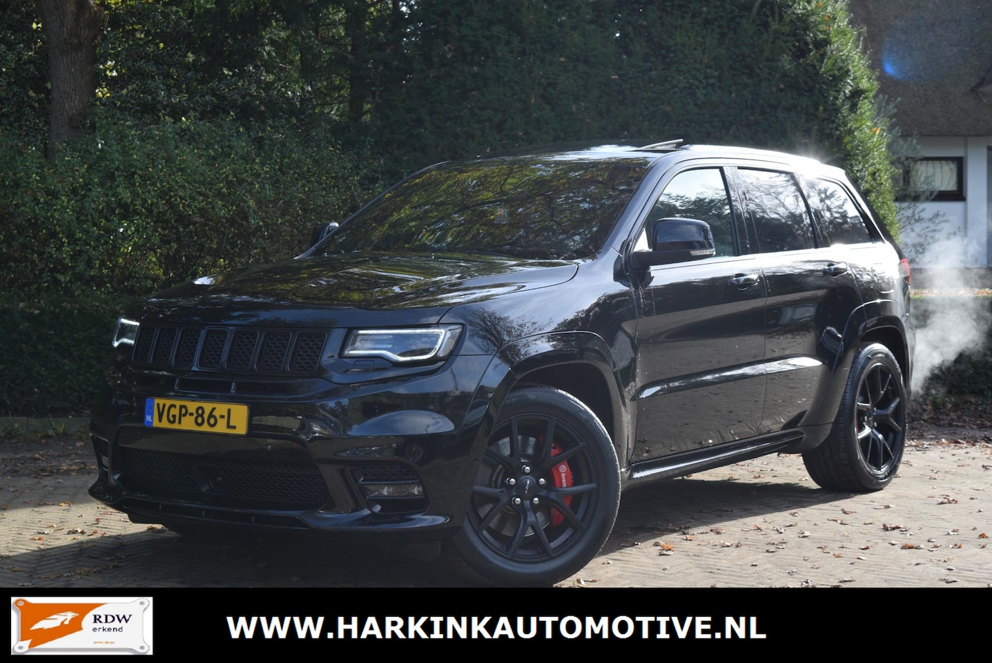 Jeep Grand Cherokee - 6.4 V8 SRT8 | Grijs kenteken | Panoramadak - AutoWereld.nl