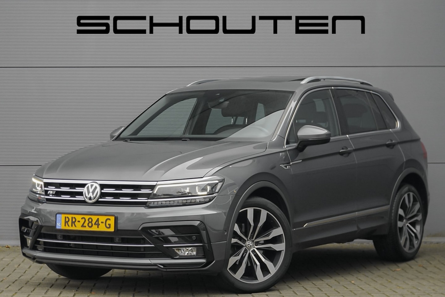 Volkswagen Tiguan - 1.4 TSI ACT R-Line Pano ACC 20" NL Auto - AutoWereld.nl