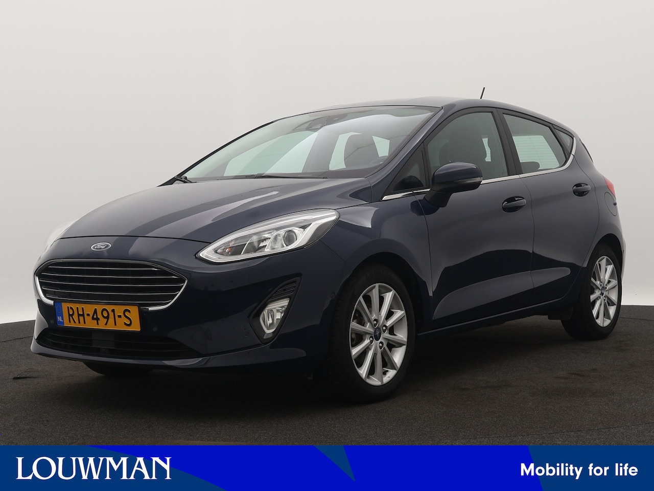 Ford Fiesta - 1.0 EcoBoost Titanium | Navigatie | Climate Control | Adaptive Cruise Control | Parkeerhul - AutoWereld.nl