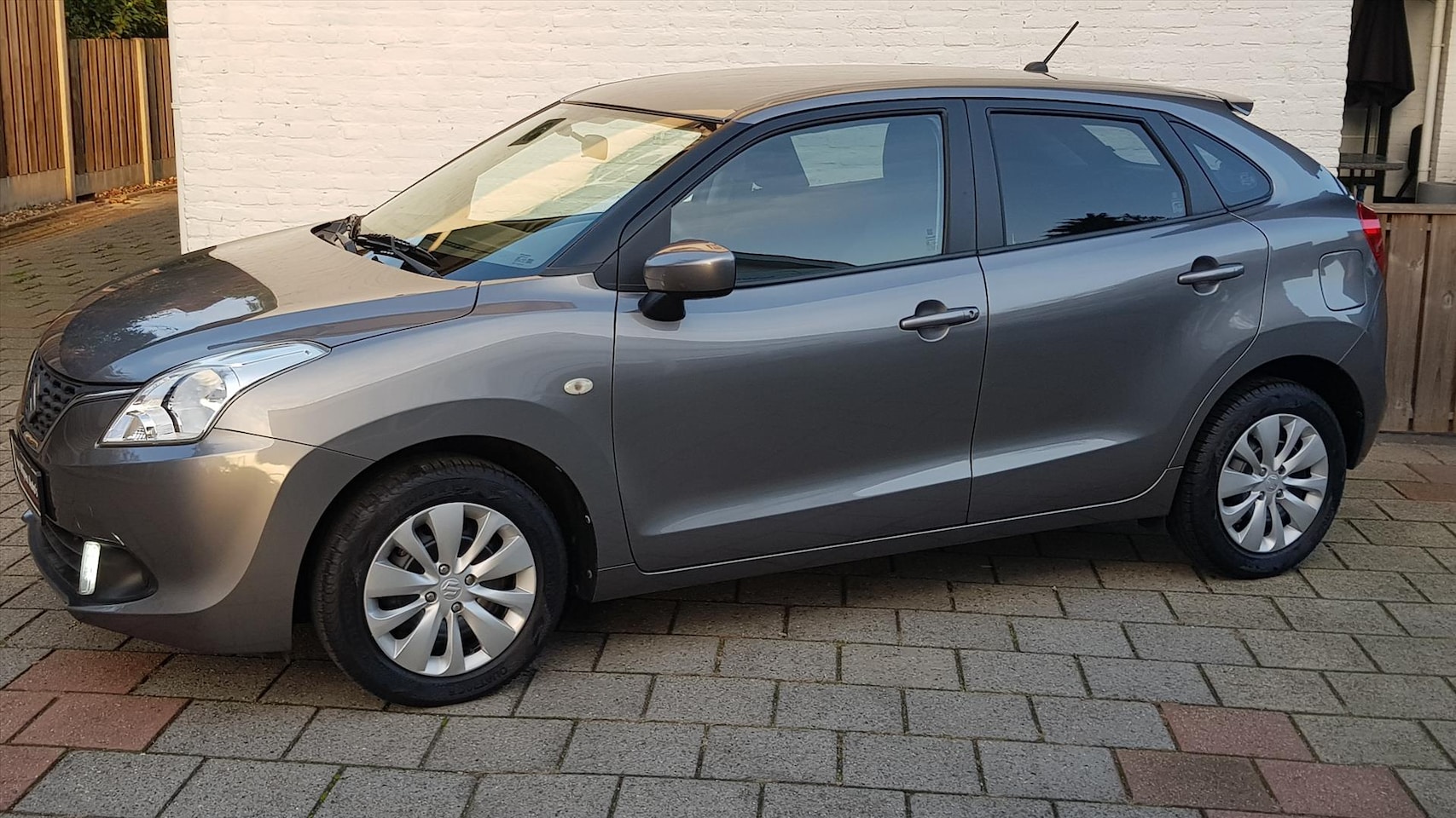 Suzuki Baleno - 1.2 5drs Dualjet 90pk limited a/c 31000 km - AutoWereld.nl