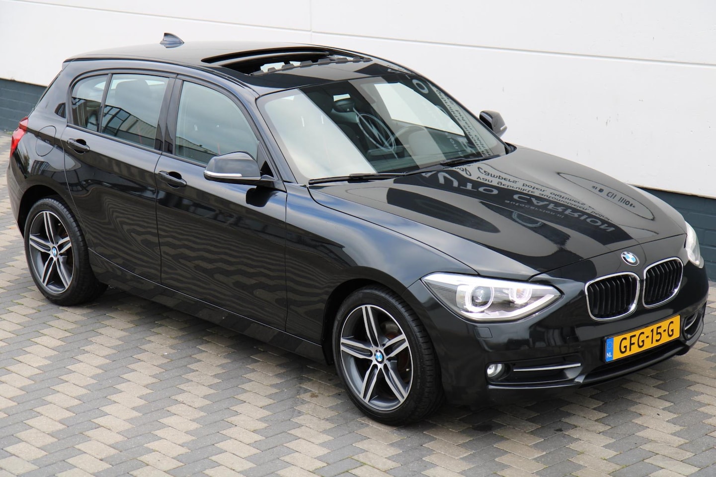 BMW 1-serie - 116i Schuifdak Xenon Trekhaak PDC Airco !! - AutoWereld.nl