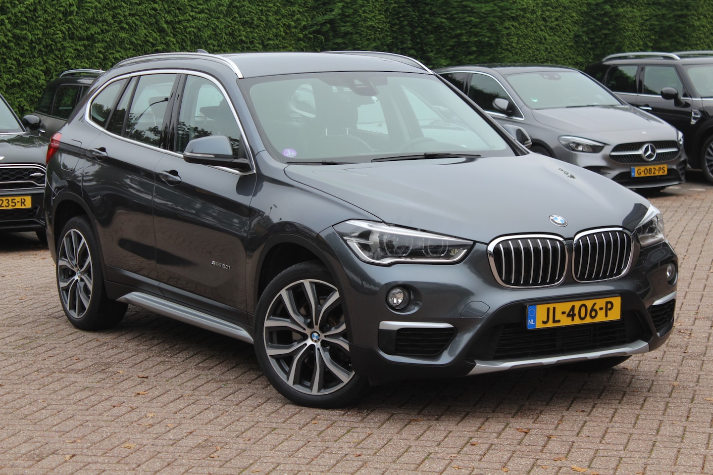 BMW X1 - sDrive20i Centennial Exe. / Camera / Head-up / Half leder / Navigatie / 18'' / Cruise Cont - AutoWereld.nl