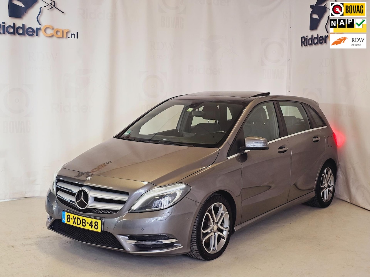 Mercedes-Benz B-klasse - 180 Ambition|GARANTIE|NAP|AUTOMAAT|PANO|TREKHAAK|CRUISE|NAVI - AutoWereld.nl