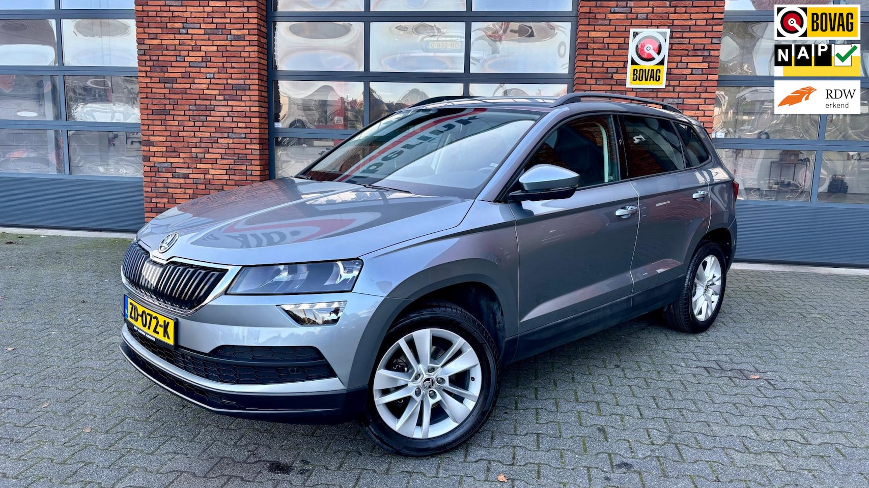 Skoda Karoq - 1.0 TSI DSG Ambition Business |Camera|Trekhaak|Cruise control - AutoWereld.nl