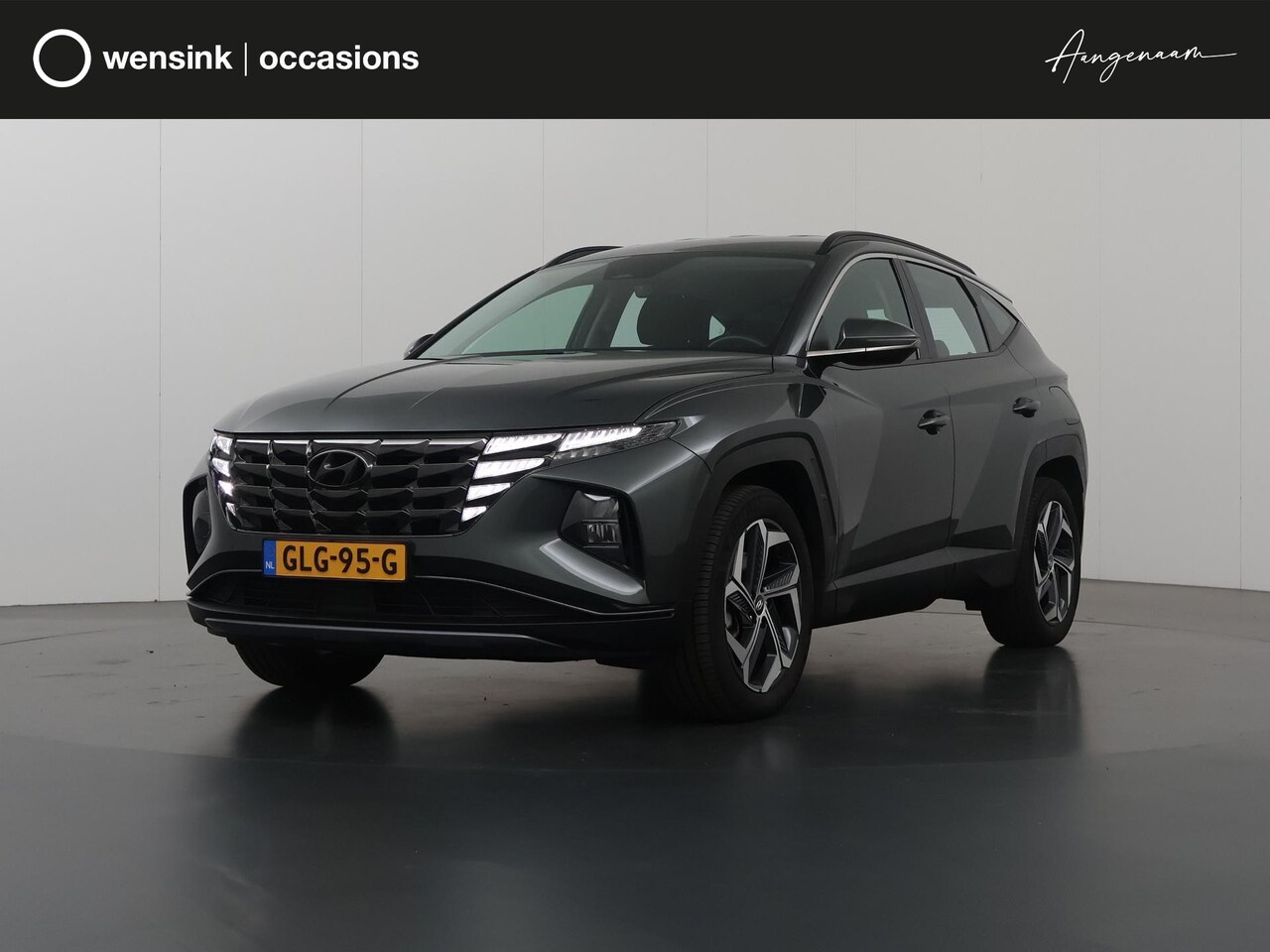 Hyundai Tucson - 1.6 T-GDI PHEV Comfort 4WD | Navigatie | Parkeercamera | Stoelverwarming | Climate Control - AutoWereld.nl