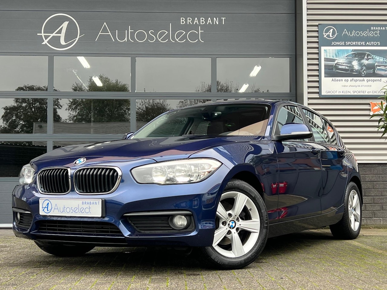 BMW 1-serie - 116i Executive Pano Navi Cruise LED - AutoWereld.nl