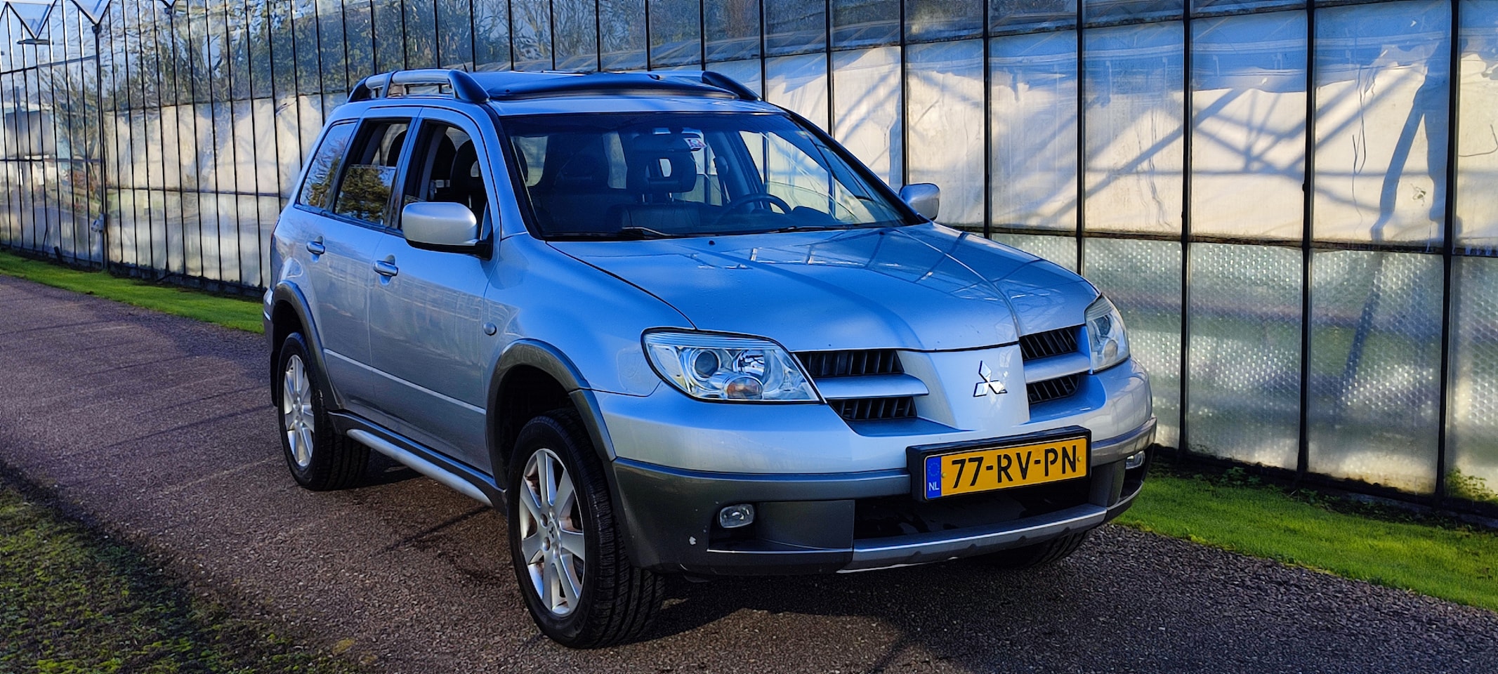 Mitsubishi Outlander - 2.4 Intense 4WD - AutoWereld.nl