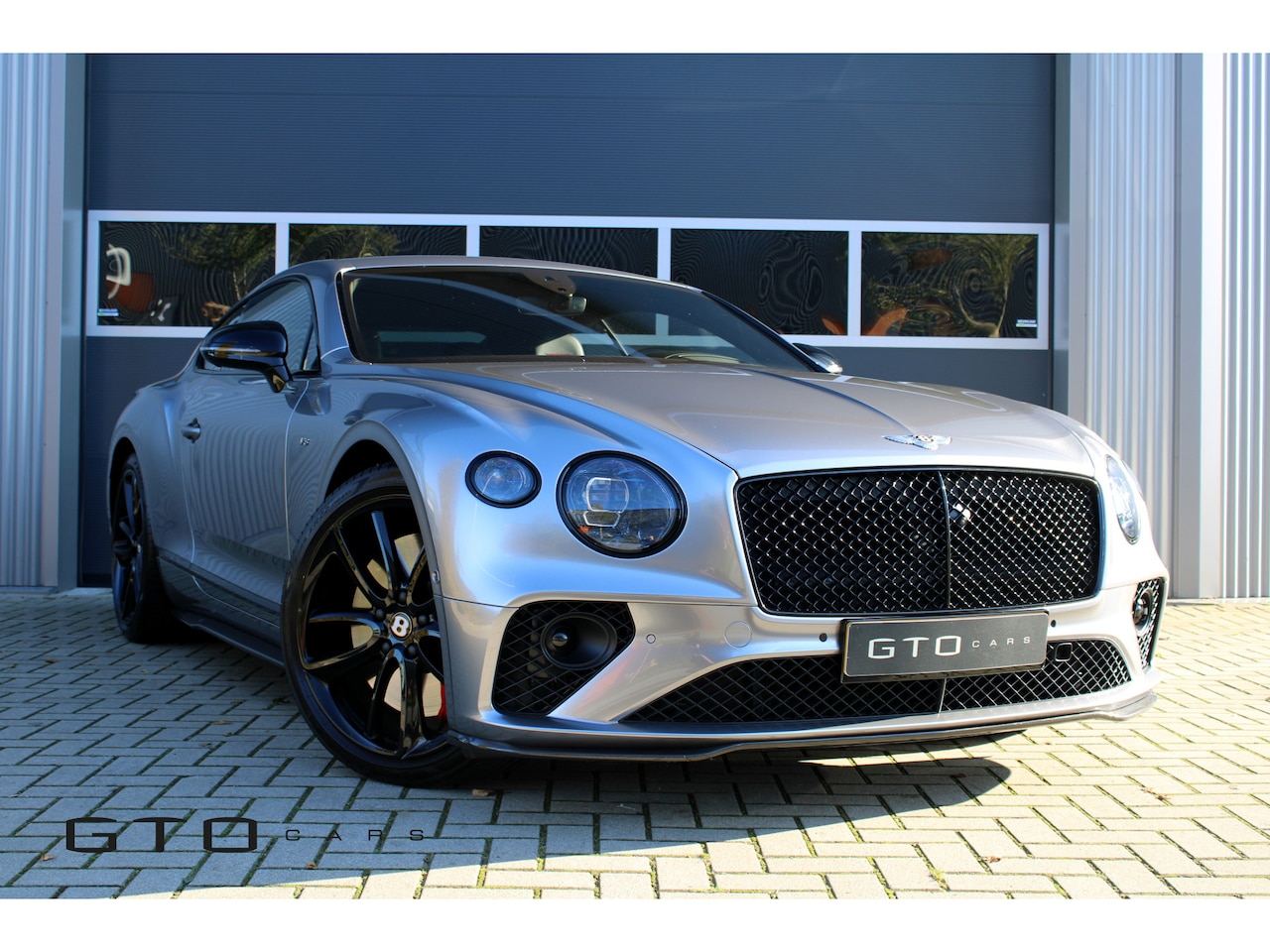 Bentley Continental GT - 4.0 V8 Centenary / Naim / Mulliner / Rotating Display / Carbon /  Nieuw staat! - AutoWereld.nl