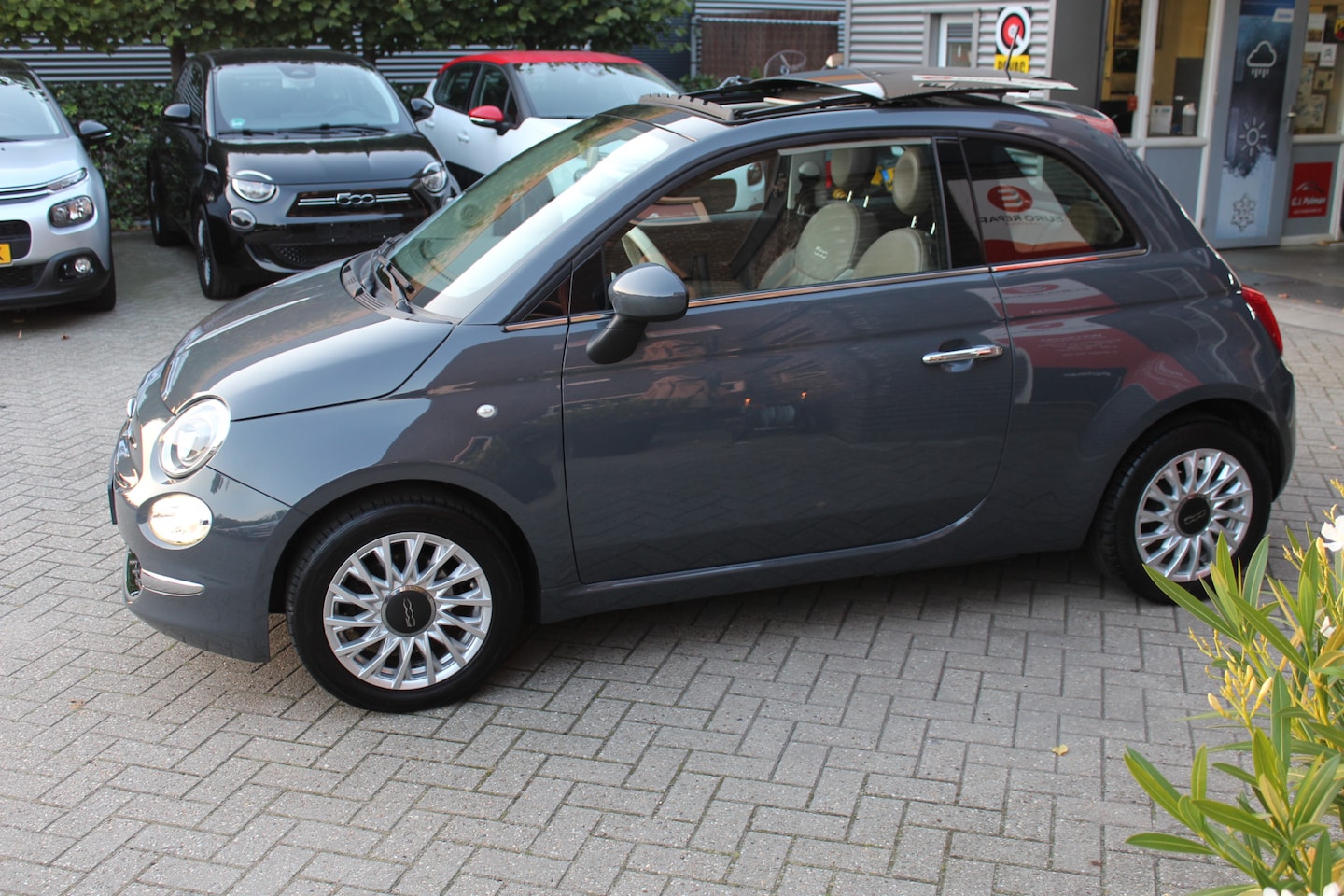 Fiat 500 - 0.9 TwinAir Turbo Lounge Schuifdak-Navi-leder 12 Maanden Bovag Garantie. - AutoWereld.nl