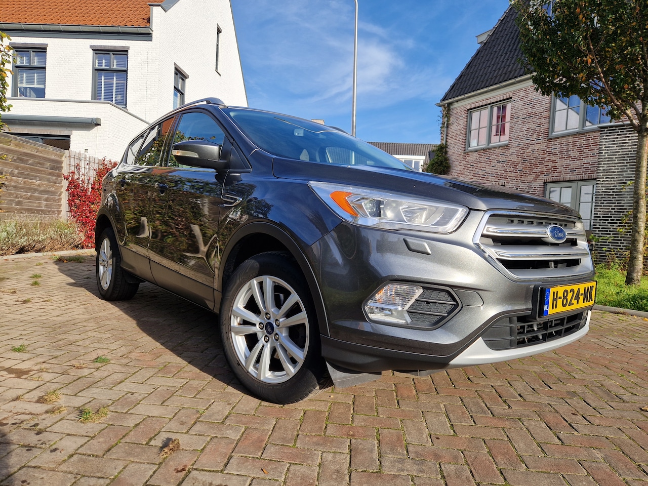 Ford Kuga - 1.5 EcoBoost Titanium Cruise Control | Winterpack | Android Auto - AutoWereld.nl