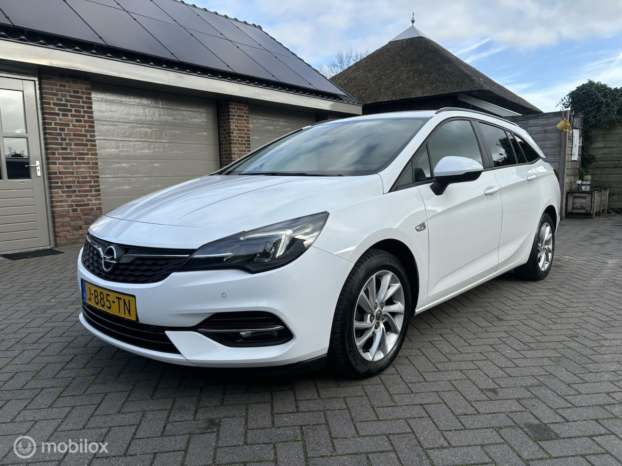 Opel Astra Sports Tourer - 1.2 Blitz Edition 1.2 Blitz Edition - AutoWereld.nl