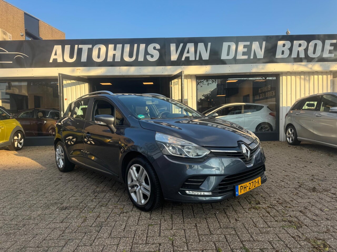 Renault Clio Estate - 0.9 TCe 90Pk Ac Led Navi Cruise Clima Ctr Pdc Lmv Dakrails - AutoWereld.nl