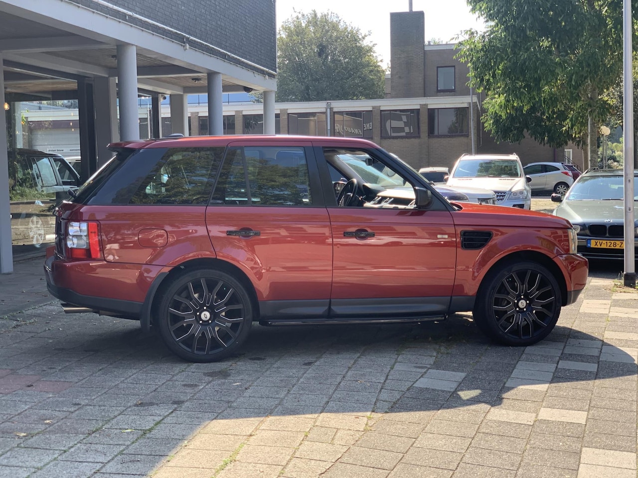 Land Rover Range Rover Sport - 5.0 V8 Supercharged 5.0 V8 supercharged - AutoWereld.nl