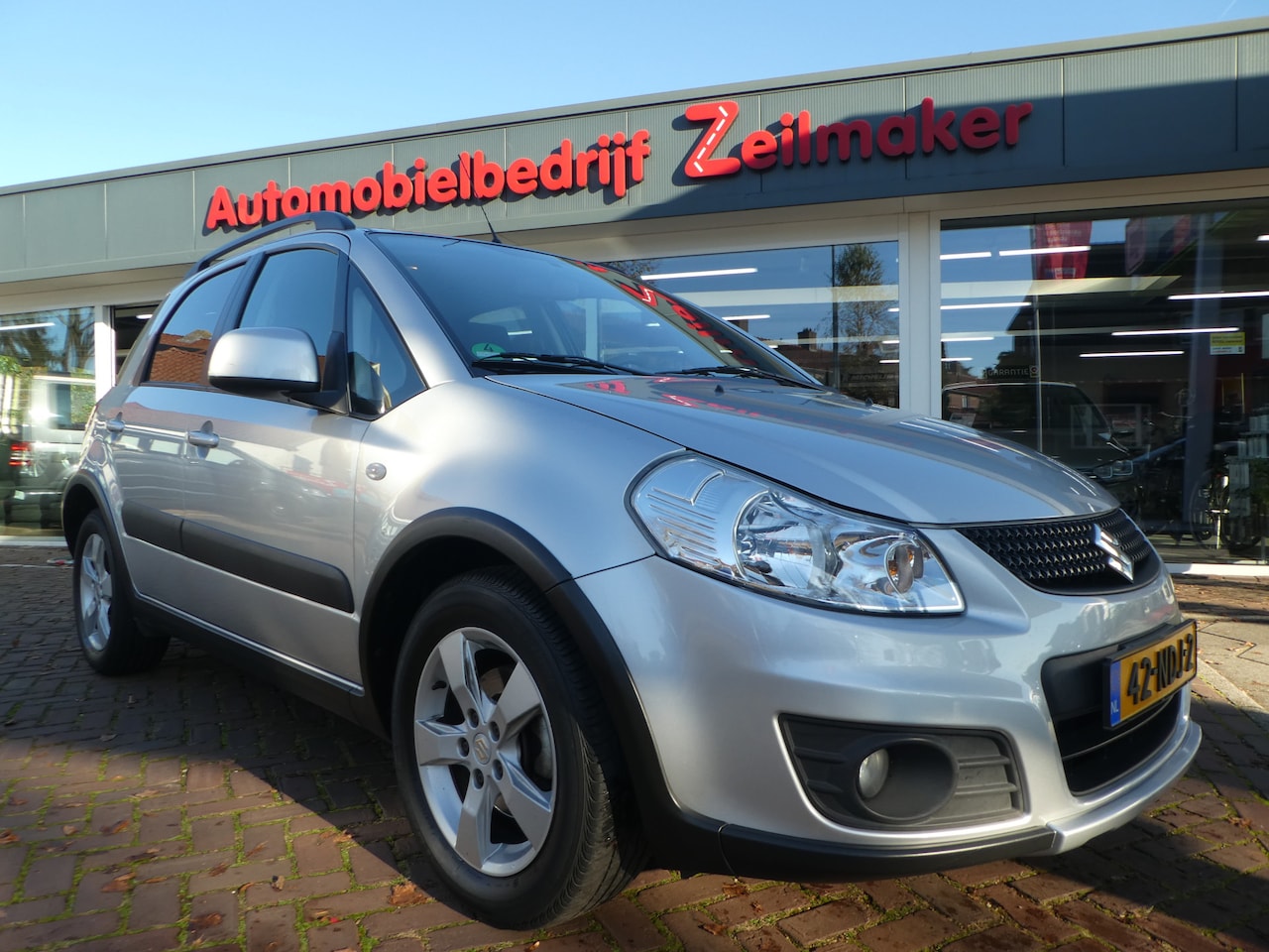 Suzuki SX4 - 1.6 Exclusive Clima, 16"Lm Velgen, Trekhaak - AutoWereld.nl