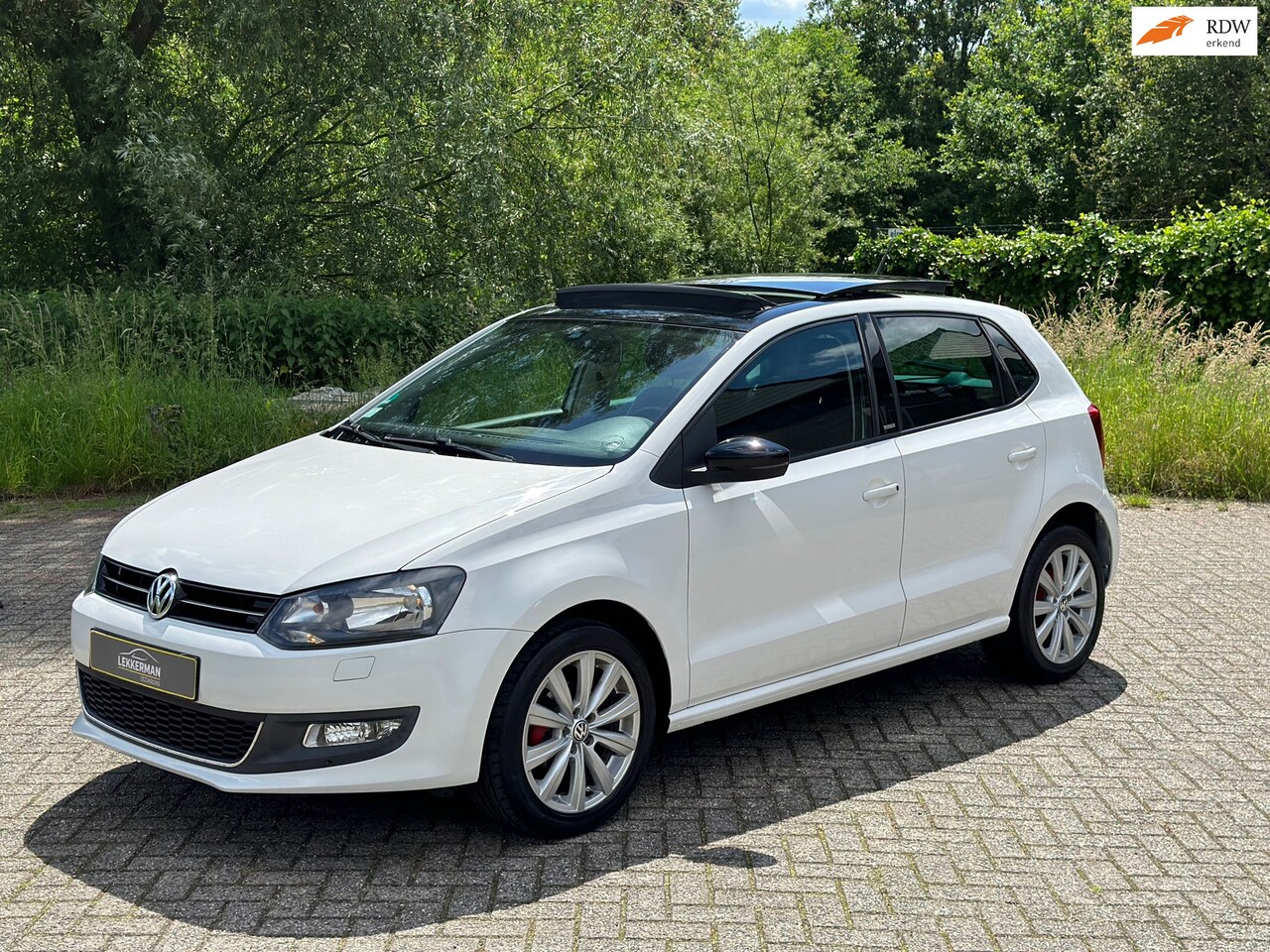 Volkswagen Polo - 1.2 High Line PANORAMADAK I STOELVERW I CRUISE IPDC - AutoWereld.nl