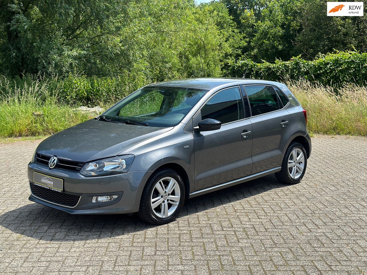 Volkswagen Polo - 1.2 High line I NWE KETTING I CRUISE I CLIMA I PDC I LEDER - AutoWereld.nl