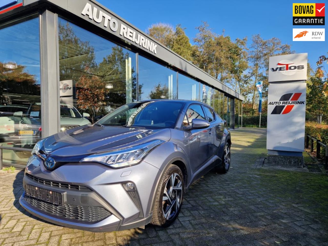 Toyota C-HR - 2.0 Hybrid Style/Leder/Stuurwielverwarming/4-seizoenenbanden/Carplay - AutoWereld.nl