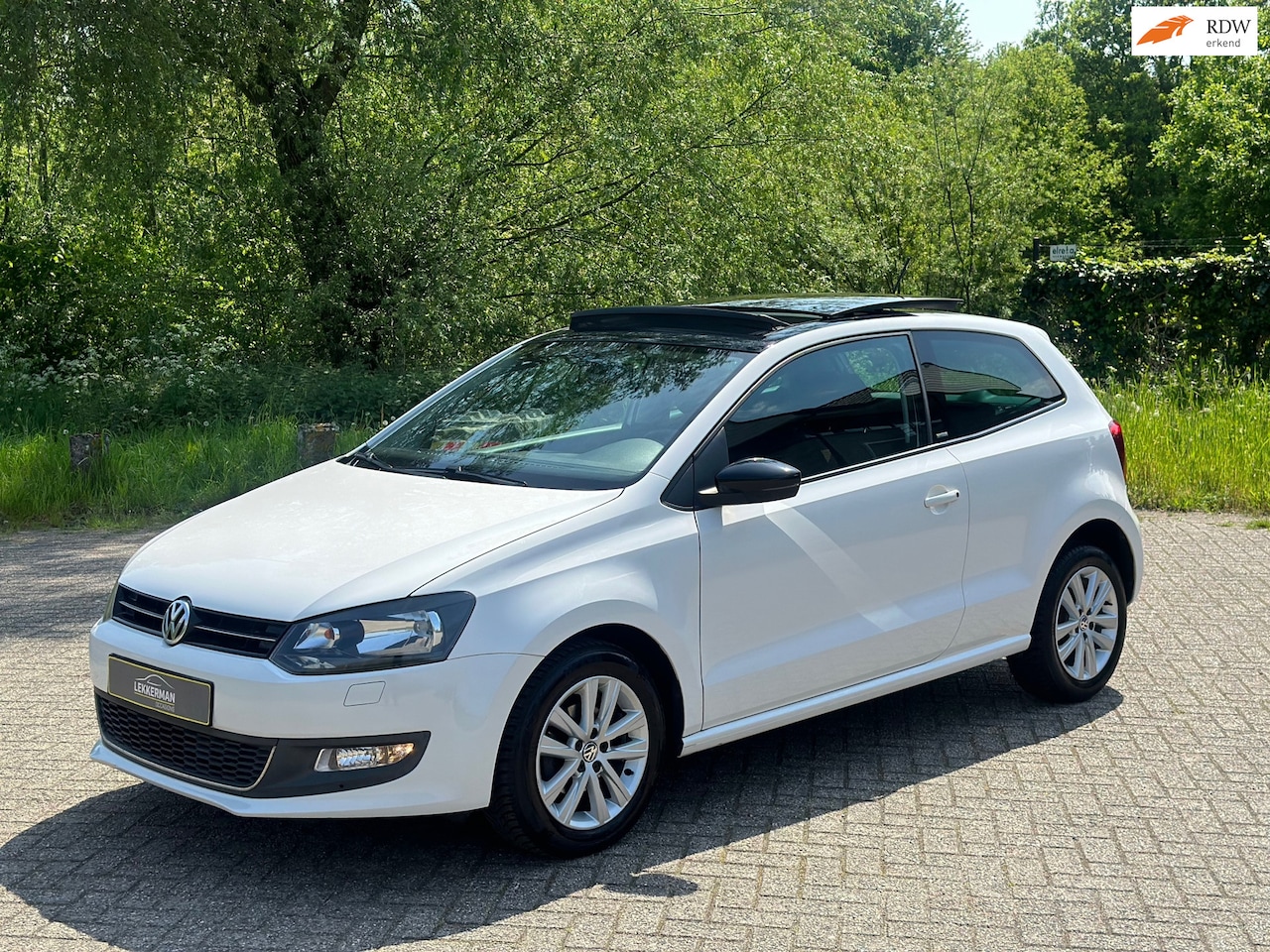 Volkswagen Polo - 1.2 High Line PANORAMADAK I STOELVERW I NWE KETTING! - AutoWereld.nl