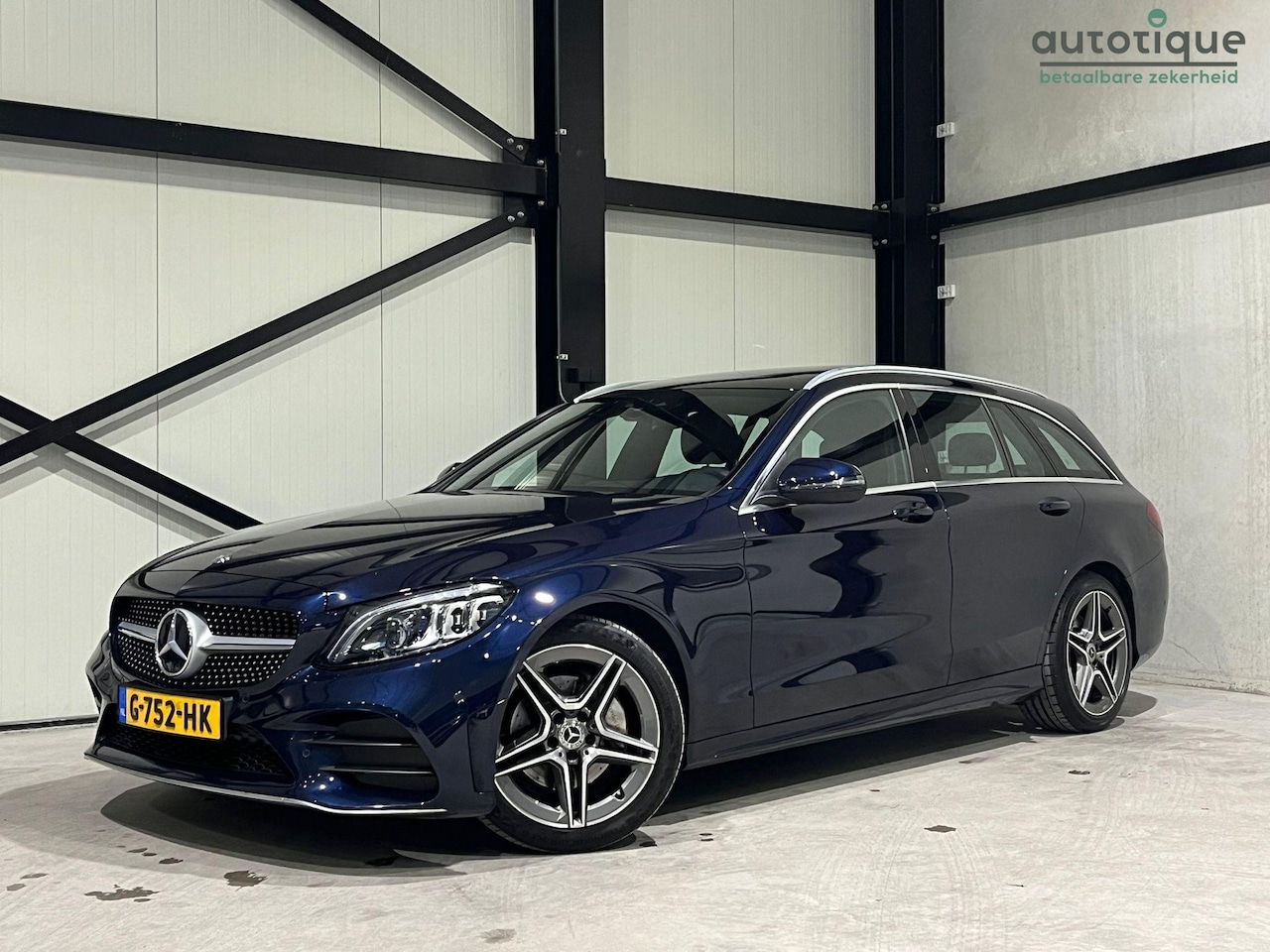 Mercedes-Benz C-klasse Estate - 180 AMG Aut. | panorama | leder | sfeer verlichting | led | - AutoWereld.nl