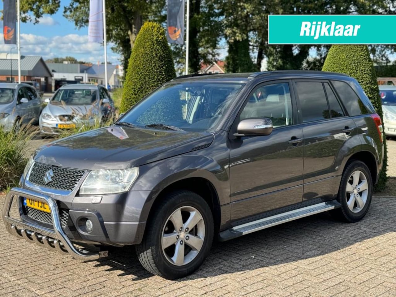 Suzuki Vitara - 2.4 EXCLUSIVE 4X4 / NAVIGATIE / LEER / SCHUIFDAK / XENON - AutoWereld.nl