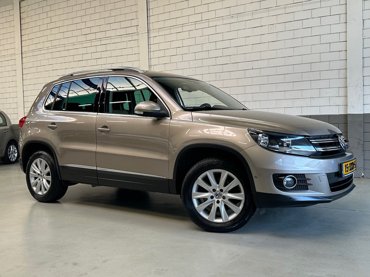 Volkswagen Tiguan - 1.4 TSI Sport&Style - AutoWereld.nl