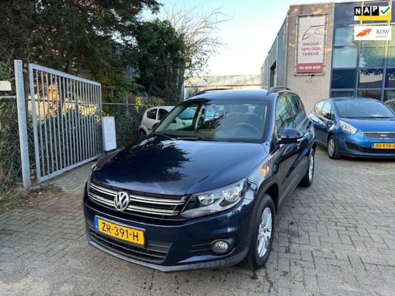 Volkswagen Tiguan - 1.4 TSI Comfort&Design, Apk 12/2025, - AutoWereld.nl