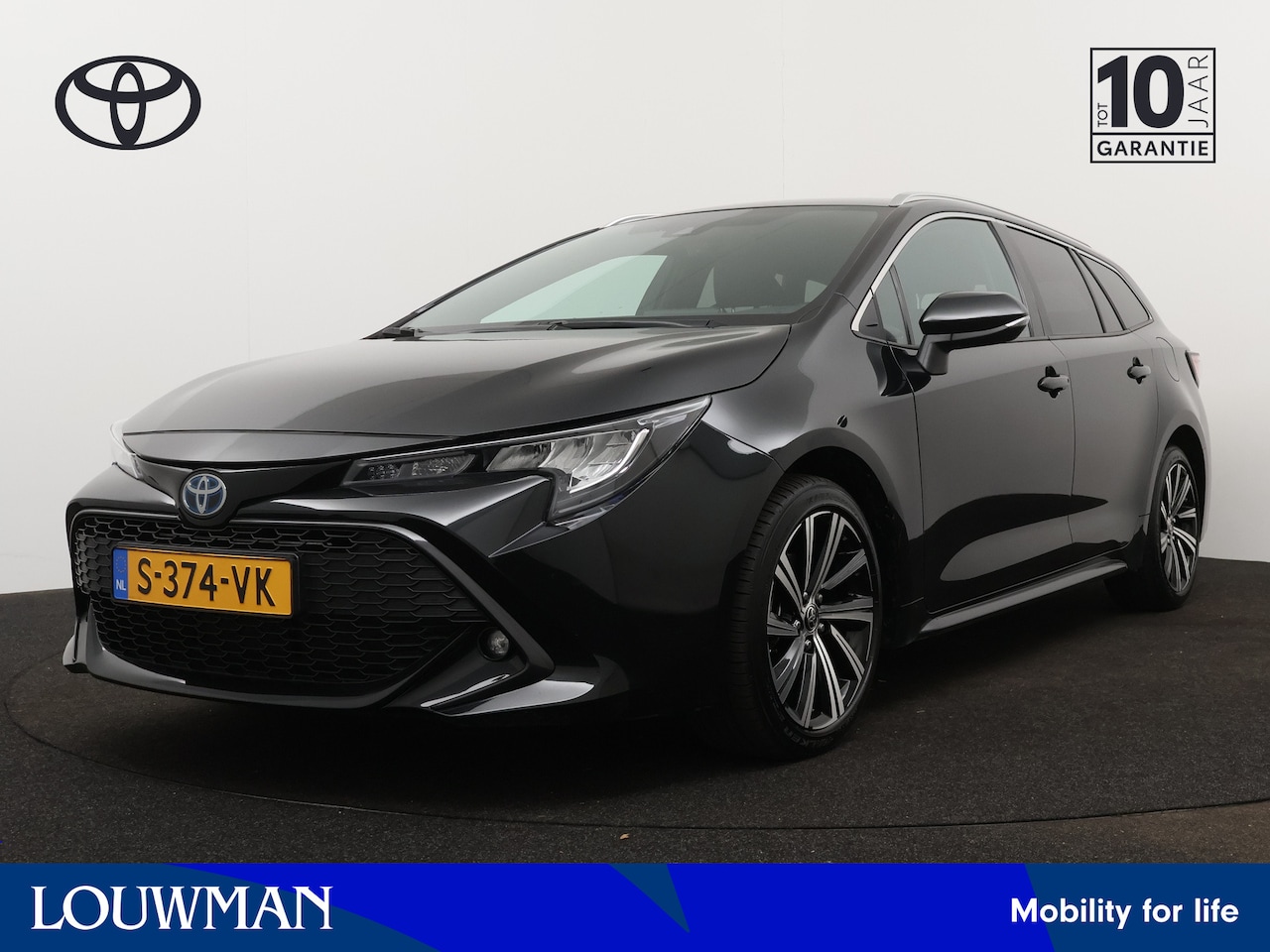 Toyota Corolla Touring Sports - 1.8 Hybrid Dynamic | Camera | Climate Control | Stoelverwarming | Draadloze telefoonlader - AutoWereld.nl