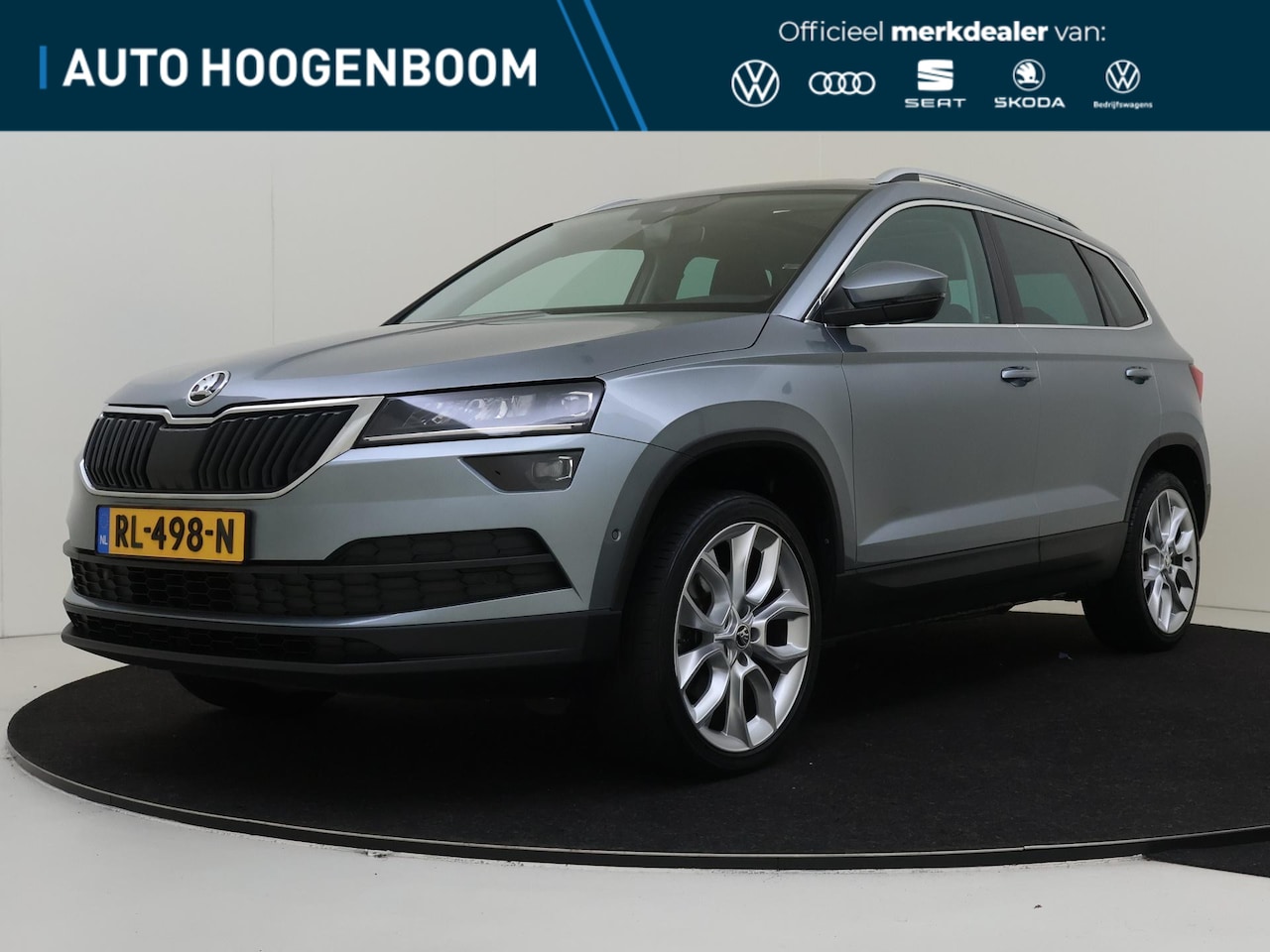 Skoda Karoq - 1.5 TSI ACT Style Business | Panoramadak | Keyless | Achteruitrijcamera | Stoelverwarming - AutoWereld.nl