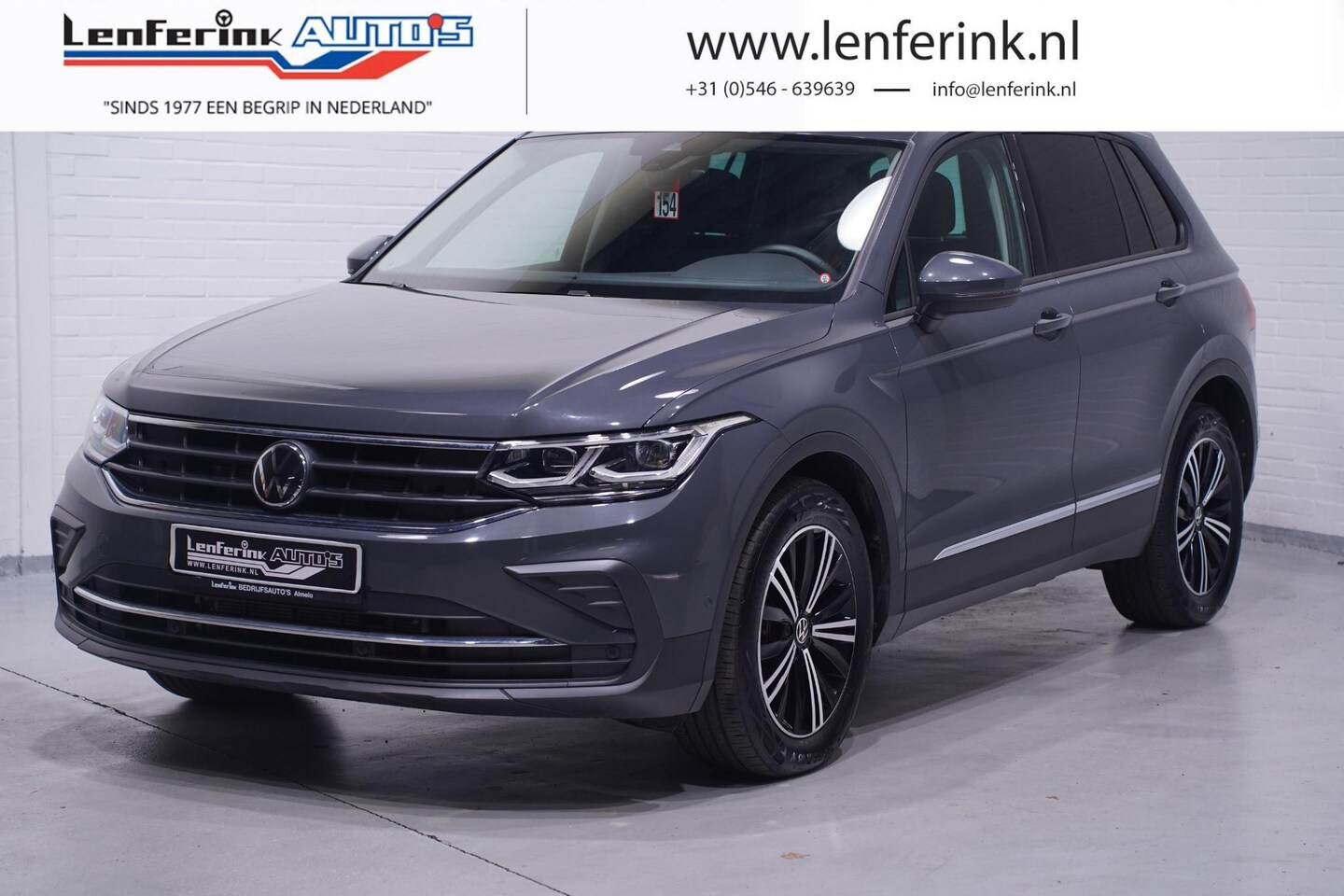 Volkswagen Tiguan - 2.0 TDI 150 pk Aut. Grijs Kenteken 2-Zits Navi Panoramadak, LED IQ Light Koplampen, Trekha - AutoWereld.nl