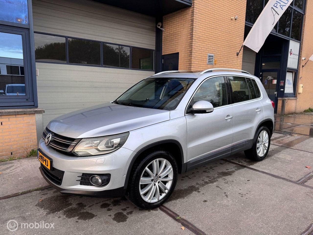 Volkswagen Tiguan - 2.0 TSI Sport&Style 4Motion - AutoWereld.nl