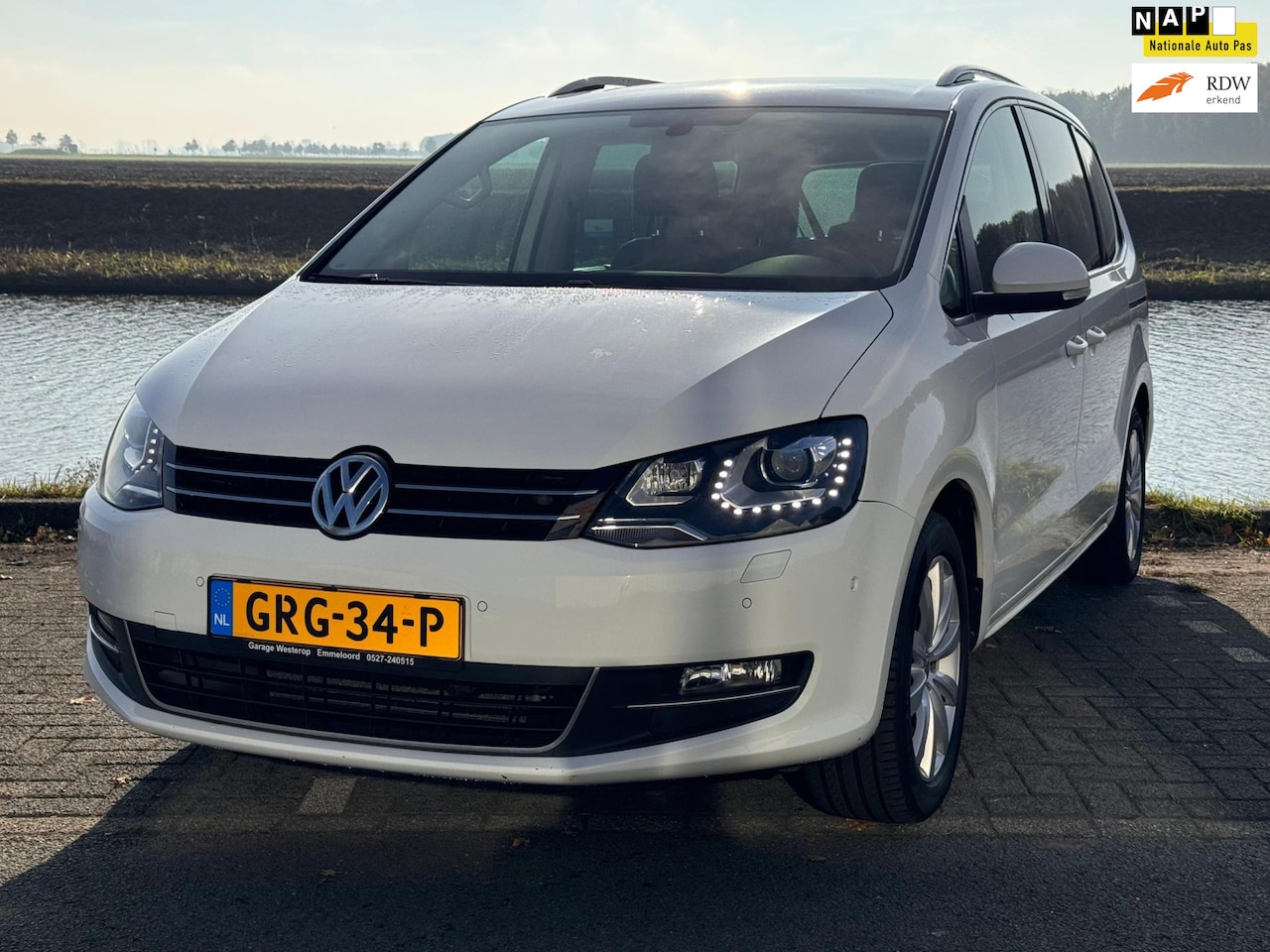 Volkswagen Sharan - 2.0 TSI Highline 7p. VOL ALLE OPTIES /pano/trekhaak/enz enz - AutoWereld.nl