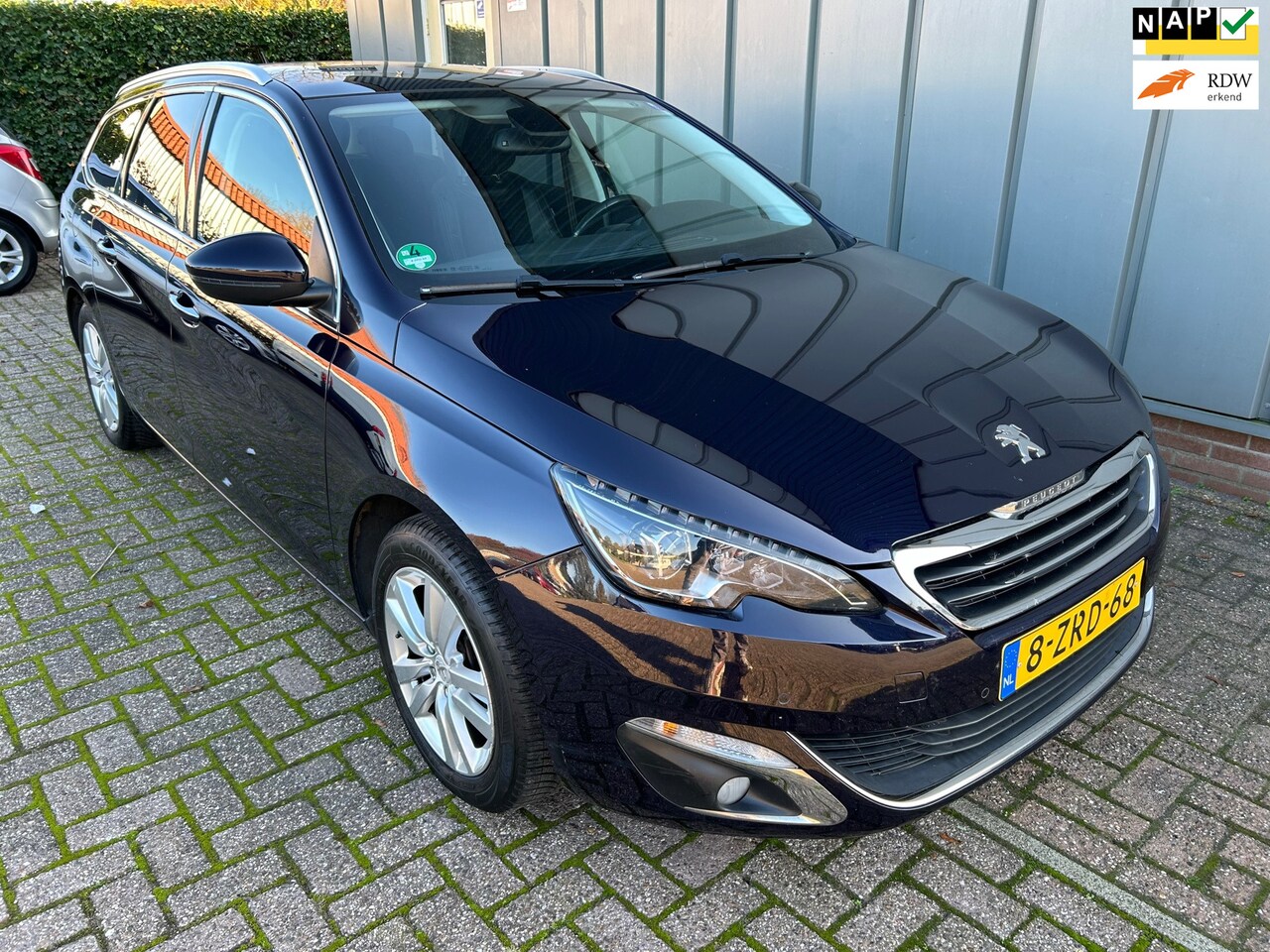 Peugeot 308 SW - 1.2 e-THP Première NAP//NAVI//AIRCO//CRUISE//PANORAMA - AutoWereld.nl