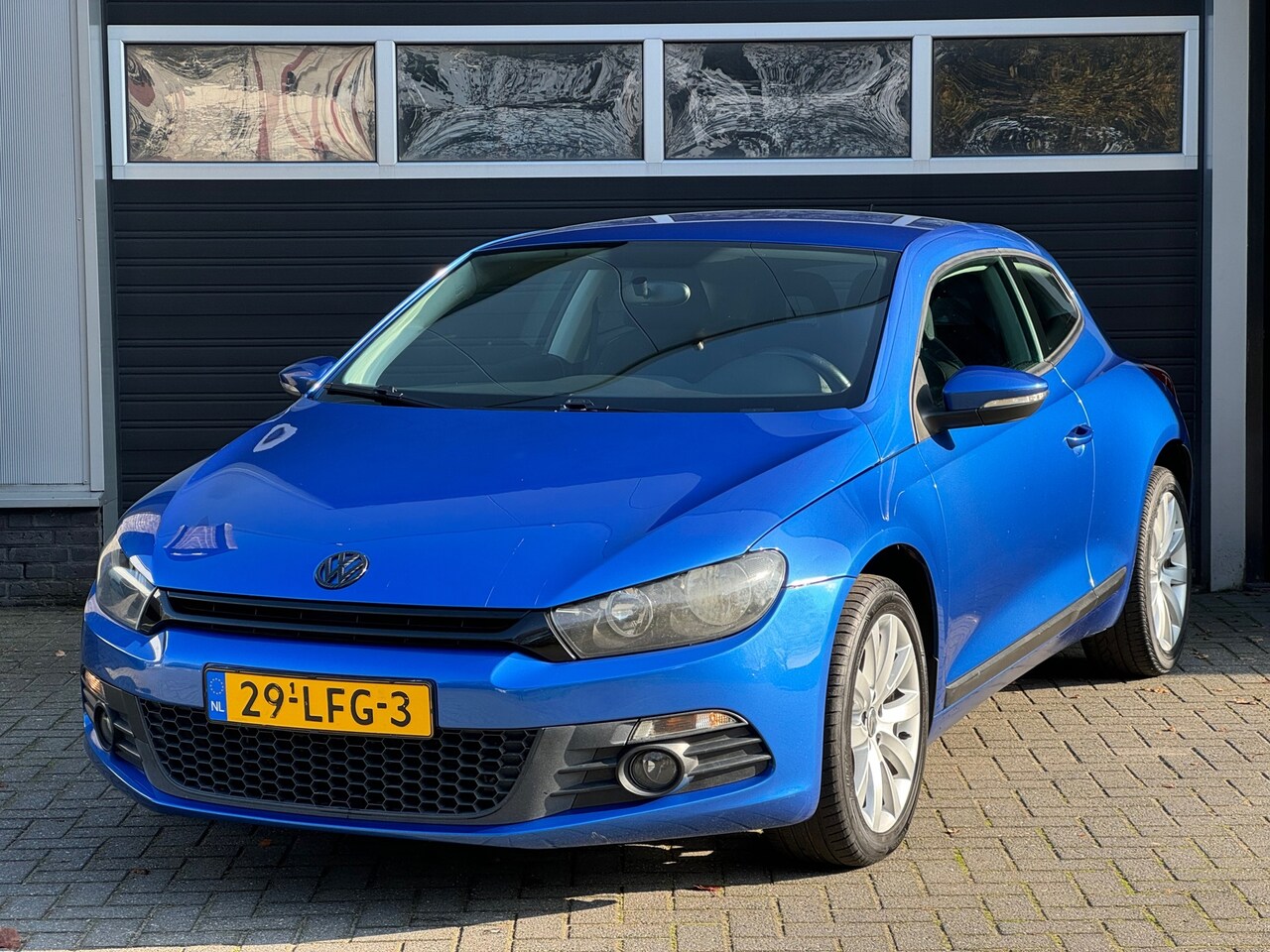 Volkswagen Scirocco - 1.4 TSI Comfortline, Cruise, Climate Control, NAP - AutoWereld.nl