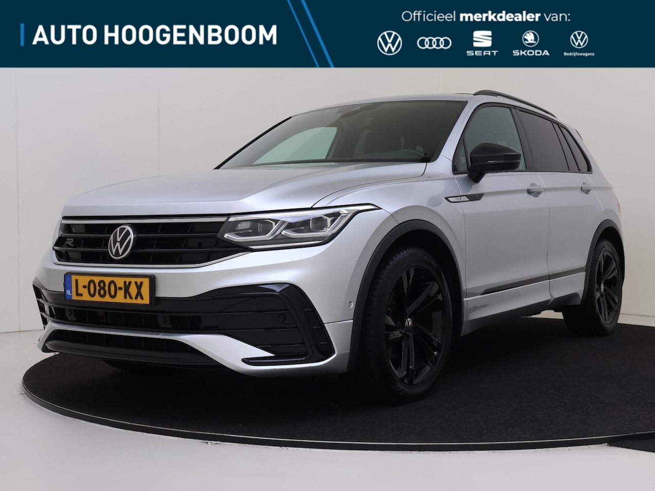 Volkswagen Tiguan - 1.5 TSI R-Line Business+ | Panoramadak | Keyless | Parkeerassistent | Stoel- en stuurwielv - AutoWereld.nl