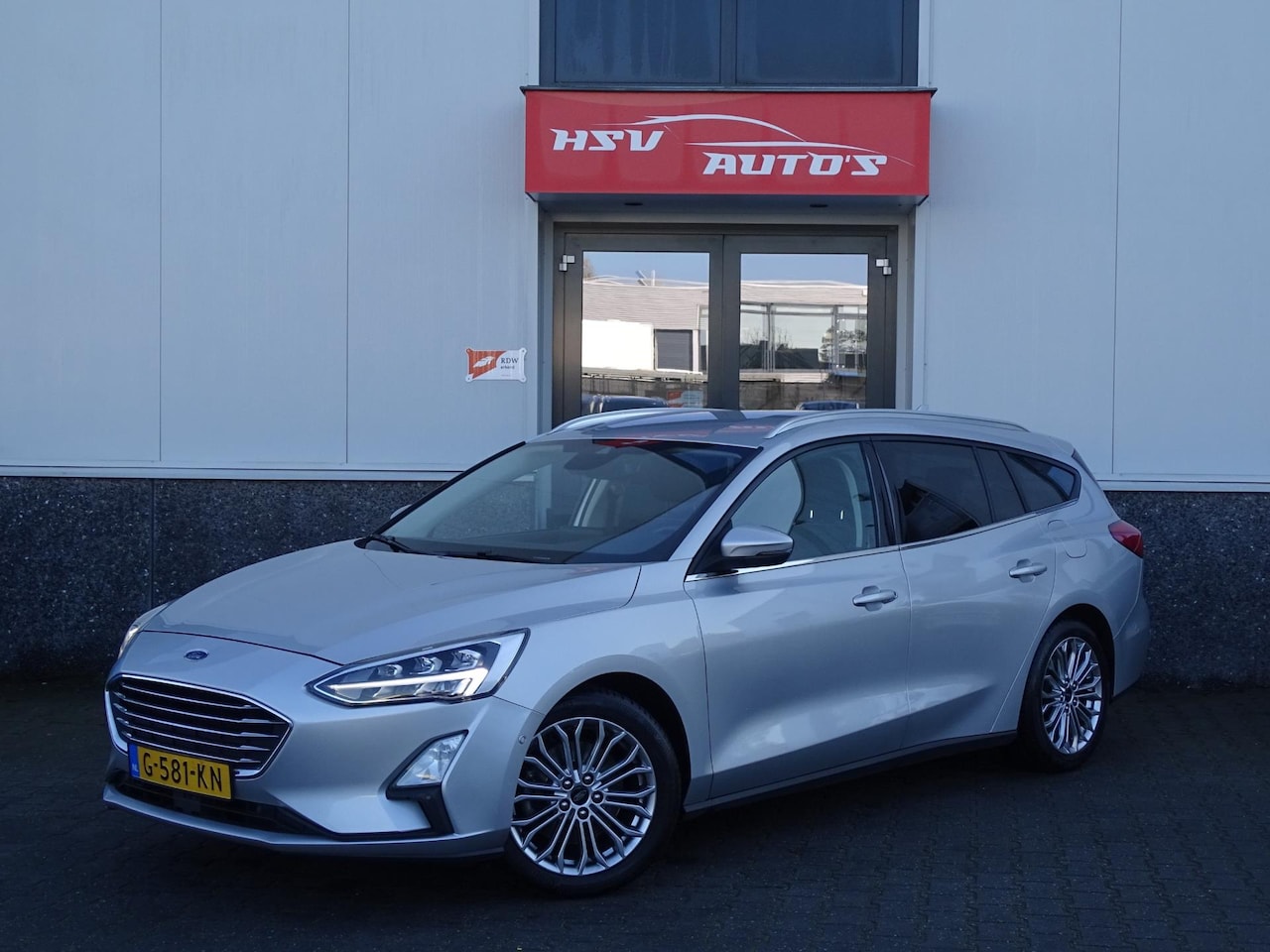 Ford Focus Wagon - 1.0 EcoBoost Titanium Business navi airco - AutoWereld.nl